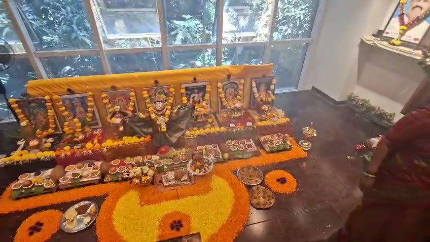 A decorated altar and rangoli prepared for worship