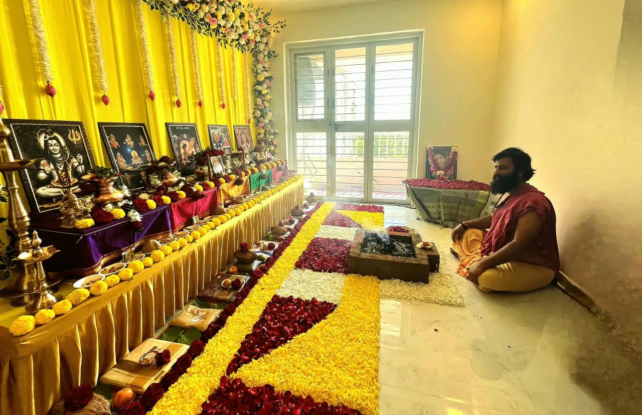 Sacred havan surrounded by an elaborate floral mandap
