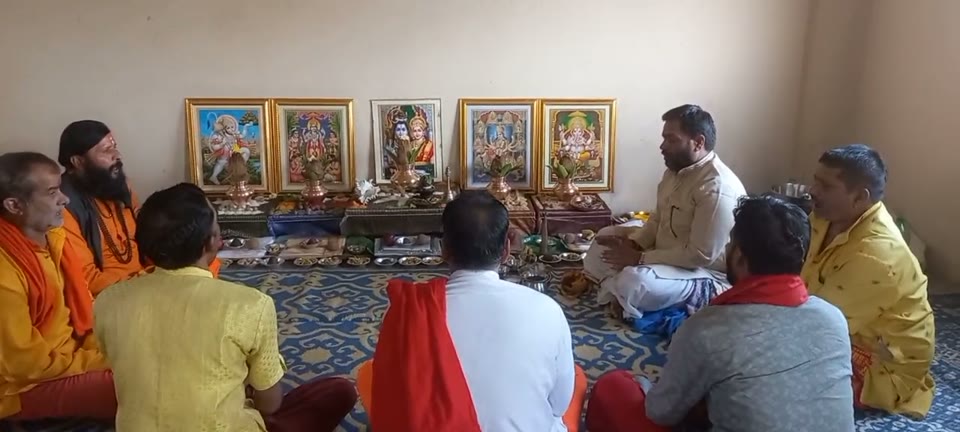 Guru Ji guiding devotees through a traditional puja