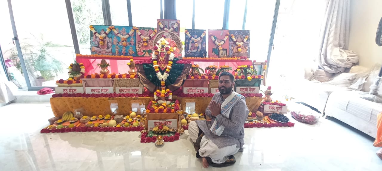 Shastra-prescribed mandal puja setup with multiple deity shrines