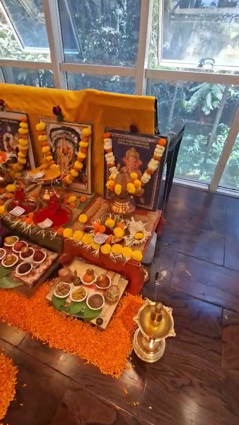 Traditional deity altar prepared with flowers and offerings
