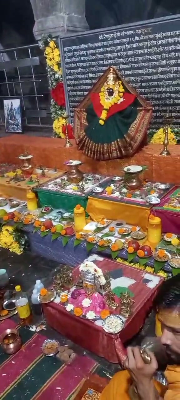 Family puja arrangement and rituals led by Acharya Ji